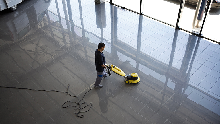 Man cleaning the floors