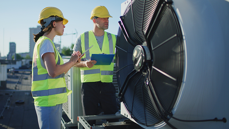 two hvac professionals