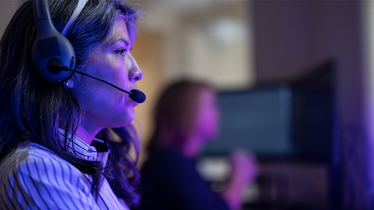 Woman on her headset talking