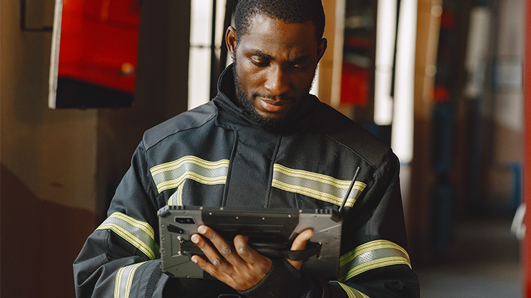 fire fighter using Communications equipment