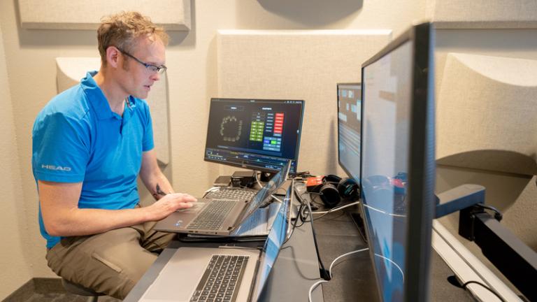 person working at computer station