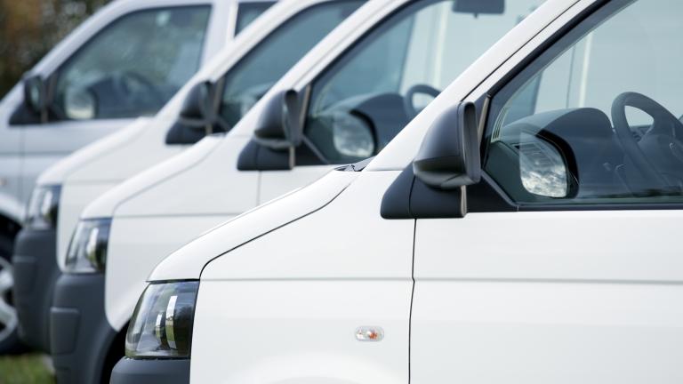 Vans parked in a row
