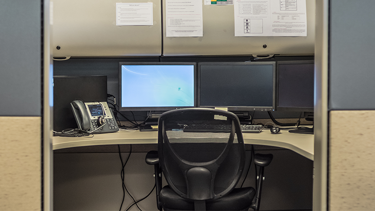 Office chair at a desk with computer