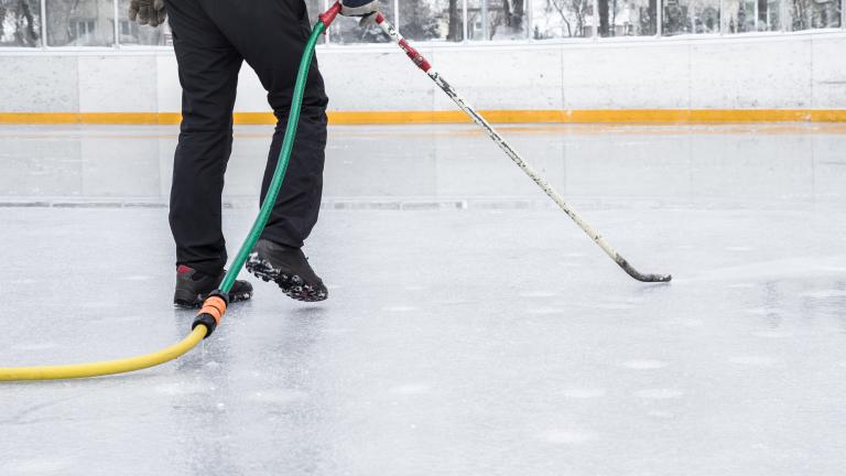 someone steaming ice at the rink