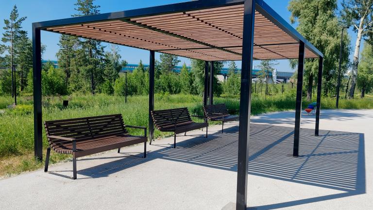 Shaded structure over outdoor benches